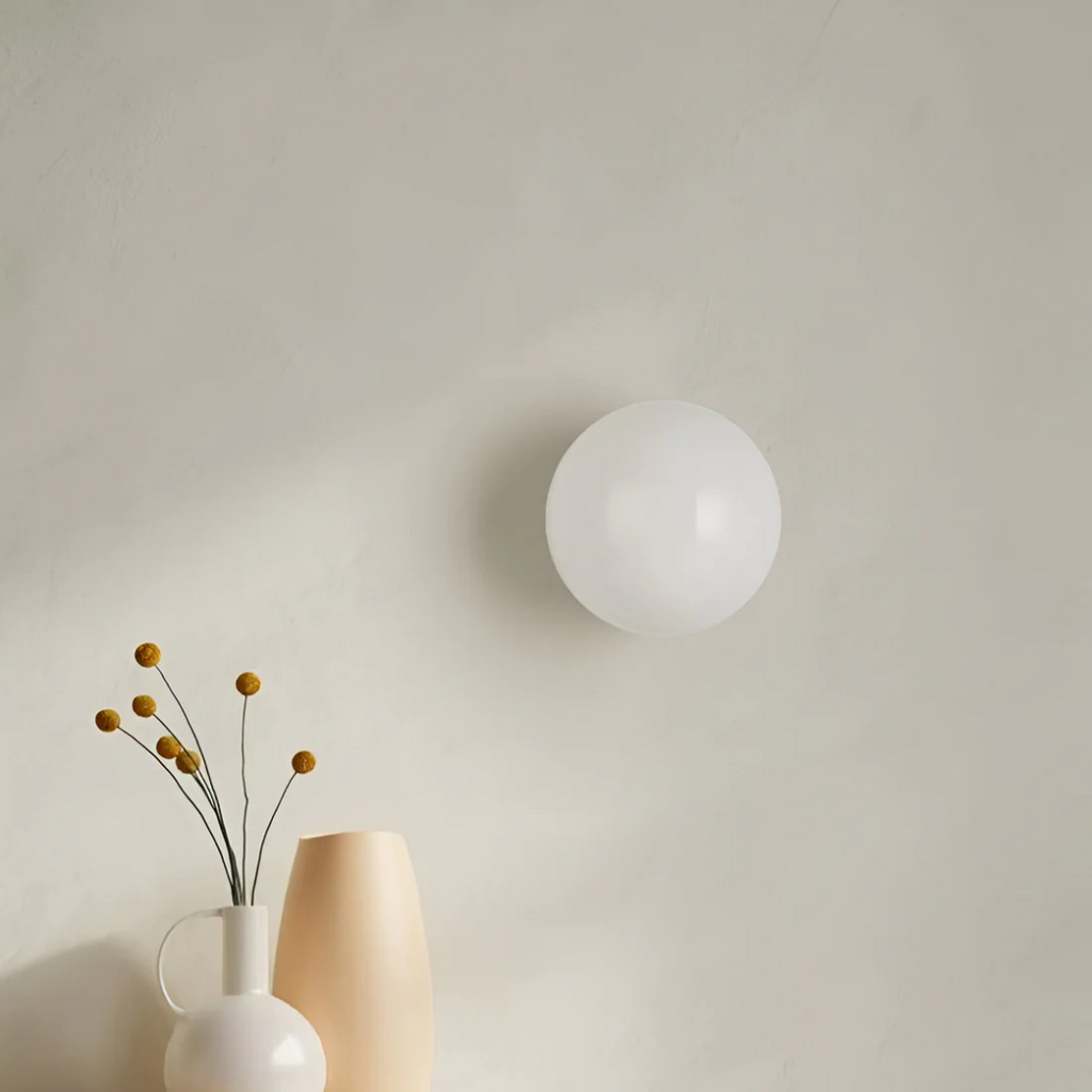 Applique da Parete in Vetro – Eleganza e Luce Sottile 