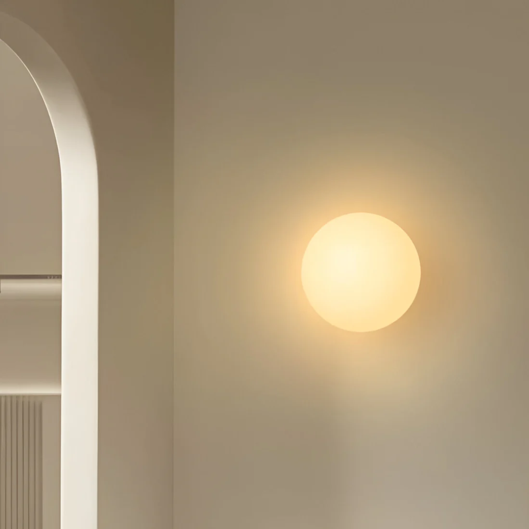 Applique da Parete in Vetro – Eleganza e Luce Sottile 